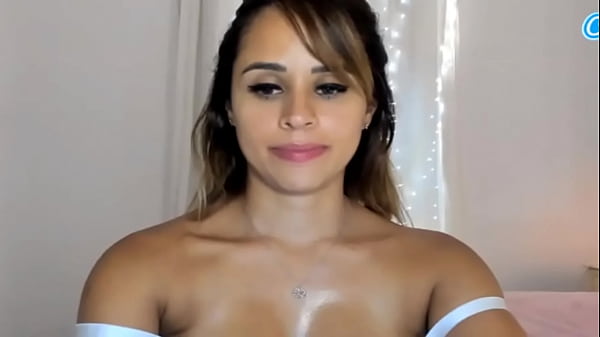 Alice Gomez, famous #WebCamModel, shows off a sexy, tanned body in lingerie with her straps down.