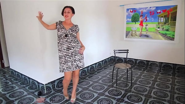 Striptease on high heels at art gallery. Broken Heels Nice woman shows her body when undressing from white-black dress. She has no panties upskirt. Chick wants to fuck too much. Show pussy. Legs open wide. Shaved cunt.