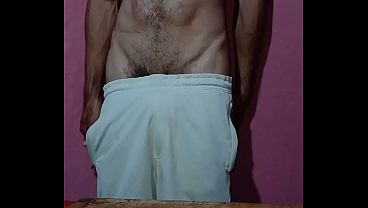 Sexy guy in pants gets naked and masturbates until he has a massive cumshot