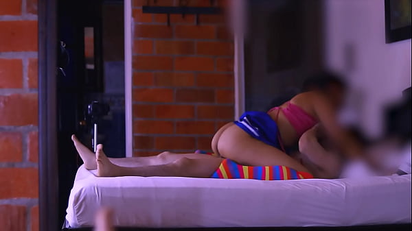 The stepsister and best friend shared a knowing smile in the living room.