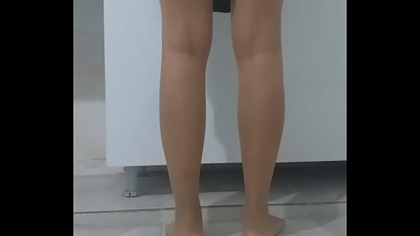 Tesett&uuml_rl&uuml_ Turkish woman revealing her upskirt while washing dishes